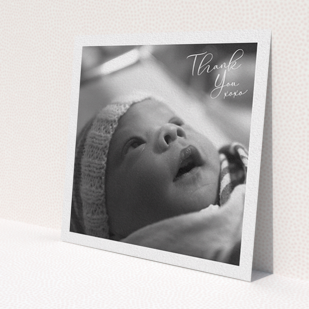A baby thank you card design named 'Simple Landscape Thanks'. It is a square (148mm x 148mm) card in a square orientation. It is a photographic baby thank you card with room for 1 photo. 'Simple Landscape Thanks' is available as a flat card, with mainly white colouring.