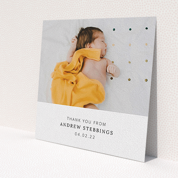 A baby thank you card named 'Simple, Portrait Thank You'. It is a square (148mm x 148mm) card in a square orientation. It is a photographic baby thank you card with room for 1 photo. 'Simple, Portrait Thank You' is available as a flat card, with mainly white colouring.