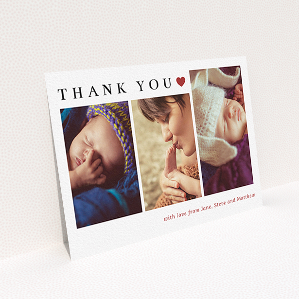 A baby thank you card design called "Simply Thanks". It is an A6 card in a landscape orientation. It is a photographic baby thank you card with room for 3 photos. "Simply Thanks" is available as a flat card, with tones of white and red.