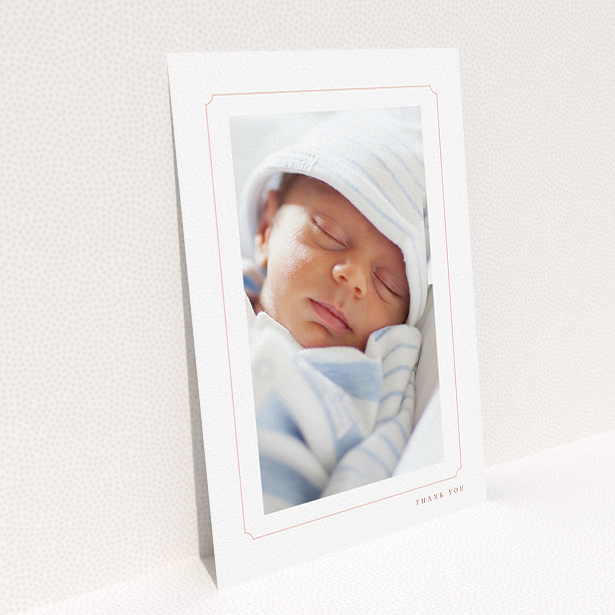 A baby thank you card called "Thin Pink". It is an A5 card in a portrait orientation. It is a photographic baby thank you card with room for 1 photo. "Thin Pink" is available as a flat card, with tones of white and pink.