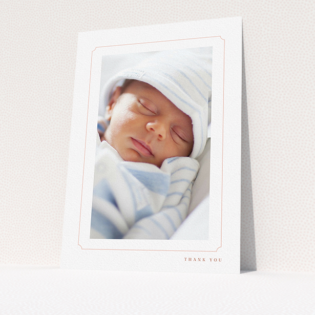 A baby thank you card called "Thin Pink". It is an A5 card in a portrait orientation. It is a photographic baby thank you card with room for 1 photo. "Thin Pink" is available as a flat card, with tones of white and pink.