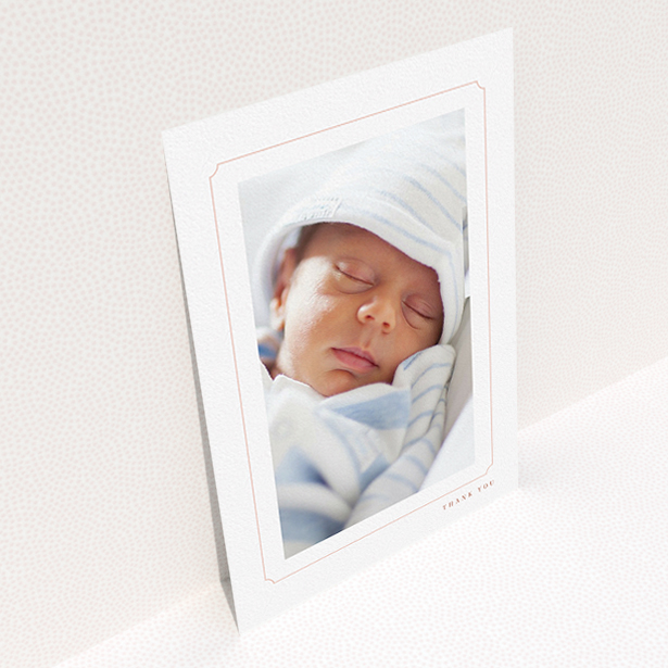 A baby thank you card called "Thin Pink". It is an A5 card in a portrait orientation. It is a photographic baby thank you card with room for 1 photo. "Thin Pink" is available as a flat card, with tones of white and pink.