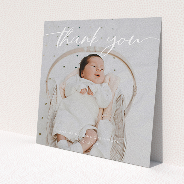 A baby thank you card design titled 'Topped and Bottomed'. It is a square (148mm x 148mm) card in a square orientation. It is a photographic baby thank you card with room for 1 photo. 'Topped and Bottomed' is available as a flat card, with mainly white colouring.