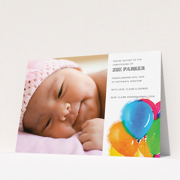 A baptism invitation called "Big Balloons". It is an A5 invite card in a landscape orientation. It is a photographic baptism invitation with room for 1 photo. "Big Balloons" is available as a flat invite card, with tones of white, orange and blue.