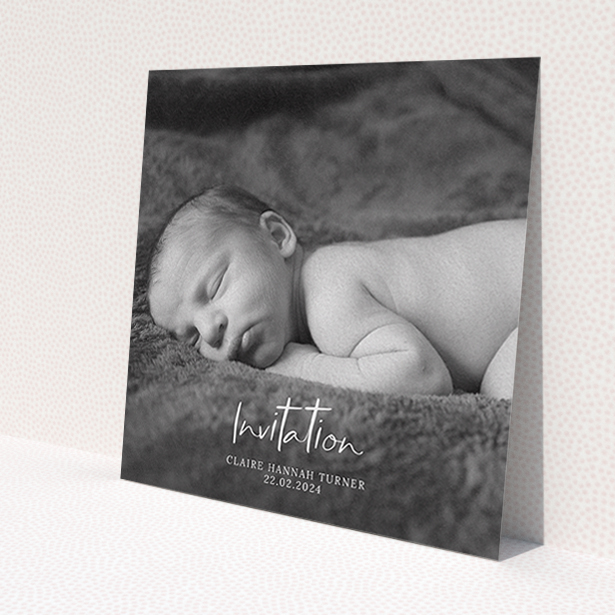 A baptism invitation design called 'Central Script'. It is a square (148mm x 148mm) invite card in a square orientation. It is a photographic baptism invitation with room for 1 photo. 'Central Script' is available as a flat invite card, with mainly white colouring.