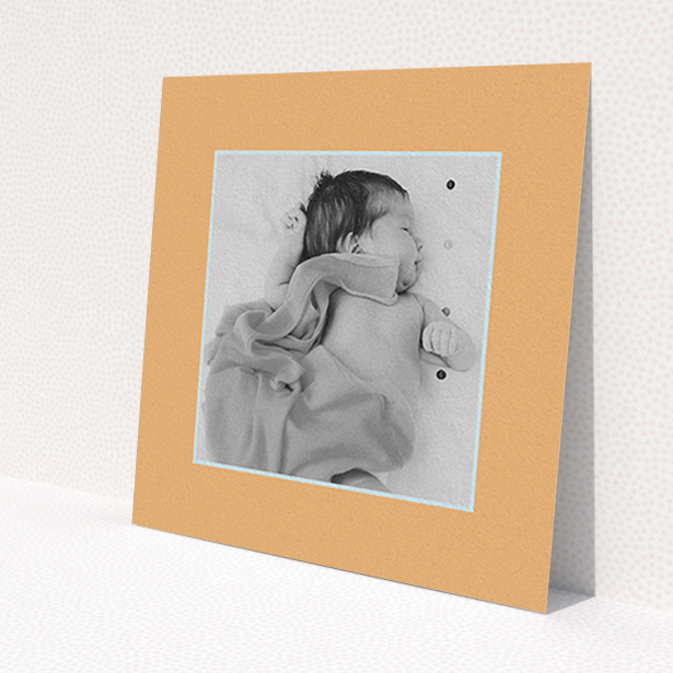 A baptism invitation named 'Orange Mint Photo Frame'. It is a square (148mm x 148mm) invite card in a square orientation. It is a photographic baptism invitation with room for 1 photo. 'Orange Mint Photo Frame' is available as a flat invite card, with tones of orange and blue.