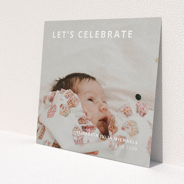 A baptism invitation design called 'Sans Serif'. It is a square (148mm x 148mm) invite card in a square orientation. It is a photographic baptism invitation with room for 1 photo. 'Sans Serif' is available as a flat invite card, with mainly white colouring.