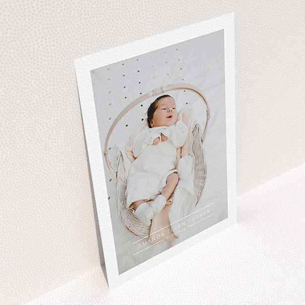 A baptism invitation template titled "Tramlines". It is an A6 invite card in a portrait orientation. It is a photographic baptism invitation with room for 1 photo. "Tramlines" is available as a flat invite card, with mainly white colouring.