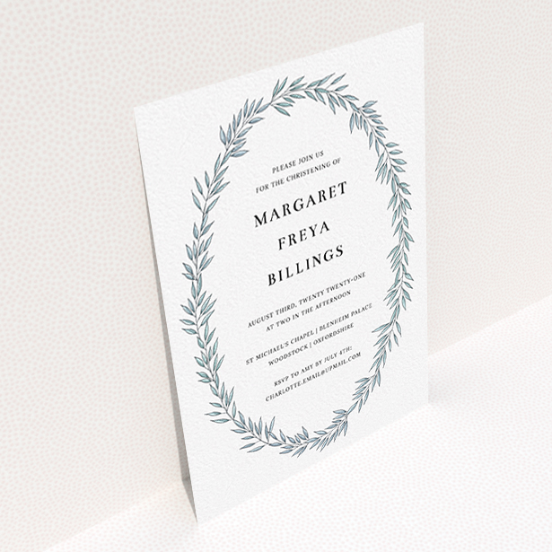 A baptism invitation design titled "Tussled Wreath". It is an A6 invite card in a portrait orientation. "Tussled Wreath" is available as a flat invite card, with tones of blue and white.