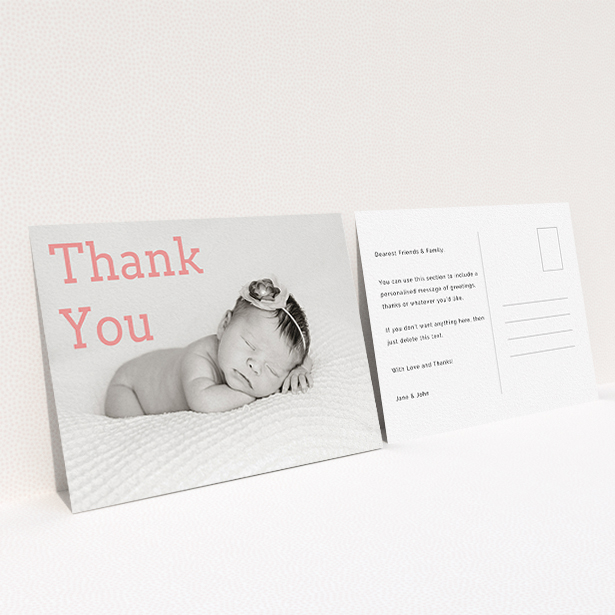 A baptism thank you card design called "Big Thanks". It is an A6 card in a landscape orientation. It is a photographic baptism thank you card with room for 1 photo. "Big Thanks" is available as a flat card, with mainly light pink colouring.