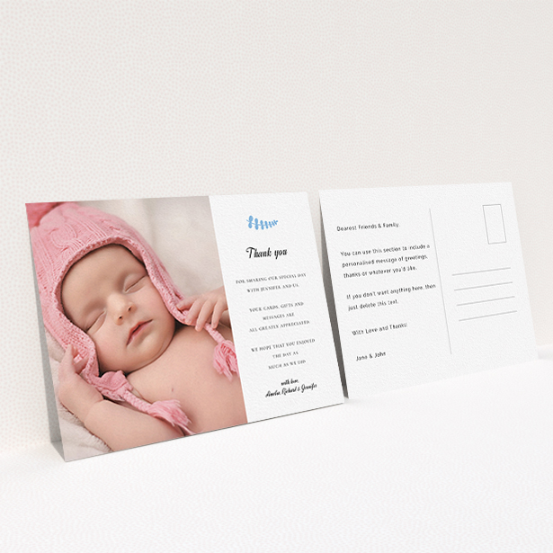 A baptism thank you card template titled "Blue Fern". It is an A6 card in a landscape orientation. It is a photographic baptism thank you card with room for 1 photo. "Blue Fern" is available as a flat card, with tones of white and blue.