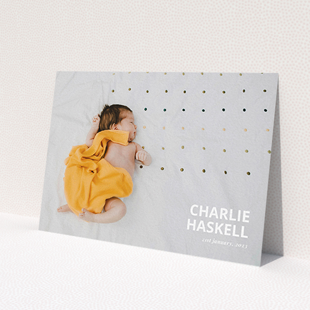 A baptism thank you card named 'Bold Photo Corner'. It is an A6 card in a landscape orientation. It is a photographic baptism thank you card with room for 1 photo. 'Bold Photo Corner' is available as a flat card, with mainly white colouring.