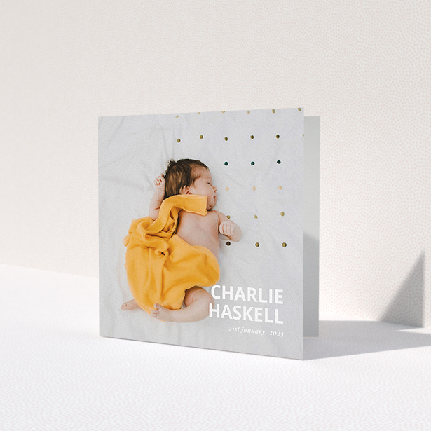 A baptism thank you card design titled 'Bold Photo Corner'. It is a square (148mm x 148mm) card in a square orientation. It is a photographic baptism thank you card with room for 1 photo. 'Bold Photo Corner' is available as a folded card, with mainly white colouring.