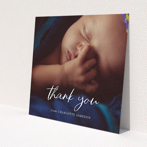 A baptism thank you card design called 'Calligraphy Thanks'. It is a square (148mm x 148mm) card in a square orientation. It is a photographic baptism thank you card with room for 1 photo. 'Calligraphy Thanks' is available as a flat card, with mainly white colouring.