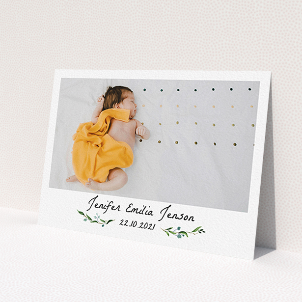 A baptism thank you card design named 'Classic Floral'. It is an A6 card in a landscape orientation. It is a photographic baptism thank you card with room for 1 photo. 'Classic Floral' is available as a flat card, with mainly green colouring.