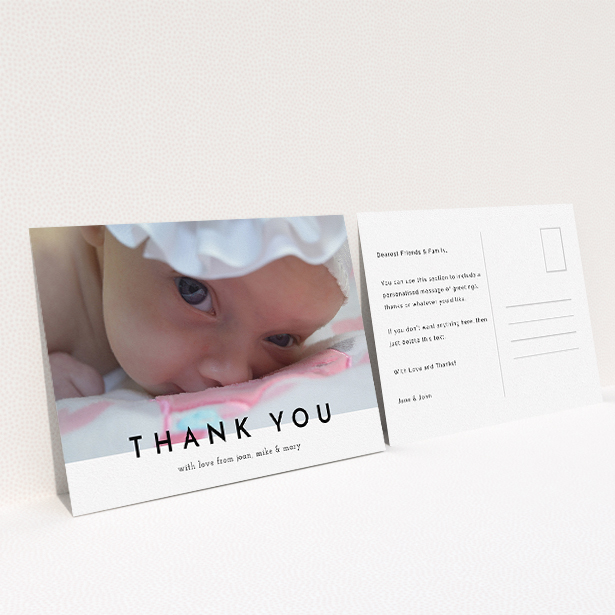 A baptism thank you card design named "Cross Border". It is an A5 card in a landscape orientation. It is a photographic baptism thank you card with room for 1 photo. "Cross Border" is available as a flat card, with mainly white colouring.
