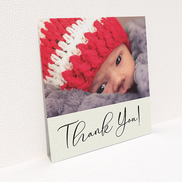 A baptism thank you card named "Cursive Thanks". It is a square (148mm x 148mm) card in a square orientation. It is a photographic baptism thank you card with room for 1 photo. "Cursive Thanks" is available as a flat card, with mainly cream colouring.