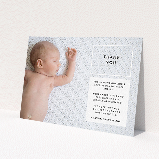 A baptism thank you card named 'Modern Side Frame'. It is an A6 card in a landscape orientation. It is a photographic baptism thank you card with room for 1 photo. 'Modern Side Frame' is available as a flat card, with mainly black colouring.
