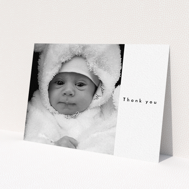 A baptism thank you card design named 'Most of the Page Frame'. It is an A6 card in a landscape orientation. It is a photographic baptism thank you card with room for 1 photo. 'Most of the Page Frame' is available as a flat card, with mainly white colouring.