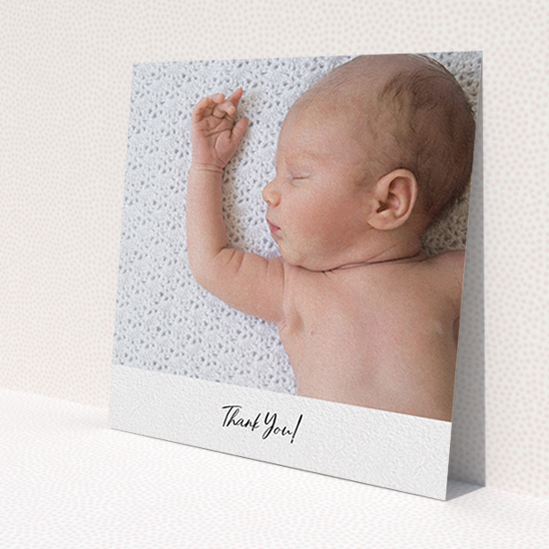 A baptism thank you card design called 'Mr & Mrs Footer'. It is a square (148mm x 148mm) card in a square orientation. It is a photographic baptism thank you card with room for 1 photo. 'Mr & Mrs Footer' is available as a flat card, with mainly white colouring.