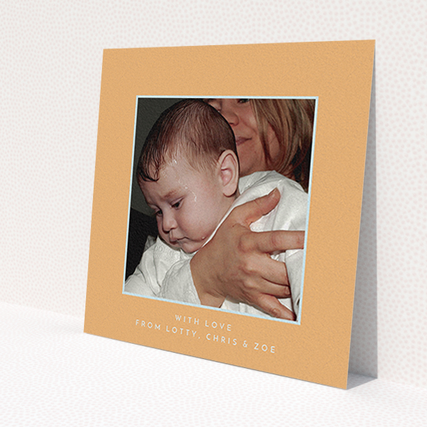 A baptism thank you card design called 'Orange and Mint'. It is a square (148mm x 148mm) card in a square orientation. It is a photographic baptism thank you card with room for 1 photo. 'Orange and Mint' is available as a flat card, with tones of orange and blue.