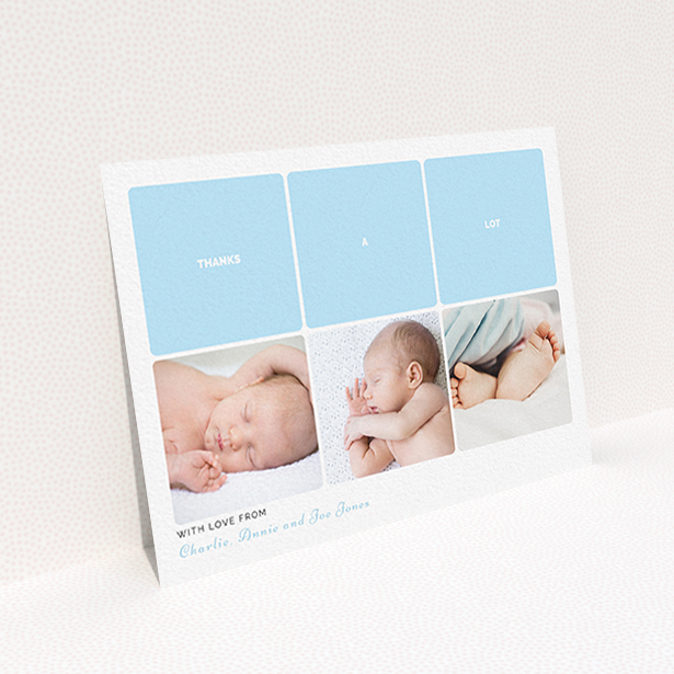 A baptism thank you card design called "Our Little One". It is an A6 card in a landscape orientation. It is a photographic baptism thank you card with room for 3 photos. "Our Little One" is available as a flat card, with tones of blue and white.