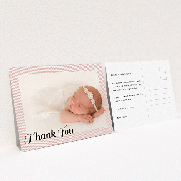 A baptism thank you card design named "Pastel Diagonals". It is an A5 card in a landscape orientation. It is a photographic baptism thank you card with room for 1 photo. "Pastel Diagonals" is available as a flat card, with mainly pink colouring.