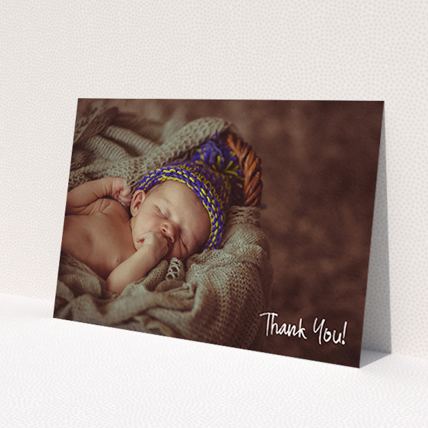 A baptism thank you card design titled 'Rough but Simple Photo'. It is an A6 card in a landscape orientation. It is a photographic baptism thank you card with room for 1 photo. 'Rough but Simple Photo' is available as a flat card, with mainly white colouring.