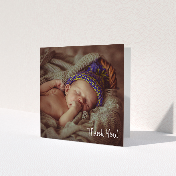 A baptism thank you card called 'Rough but Simple Photo'. It is a square (148mm x 148mm) card in a square orientation. It is a photographic baptism thank you card with room for 1 photo. 'Rough but Simple Photo' is available as a folded card, with mainly white colouring.