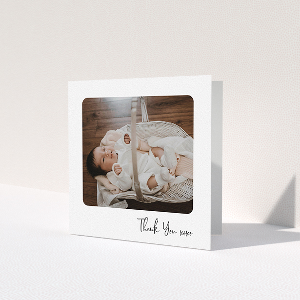 A baptism thank you card design called 'Rounded Thanks'. It is a square (148mm x 148mm) card in a square orientation. It is a photographic baptism thank you card with room for 1 photo. 'Rounded Thanks' is available as a folded card, with mainly white colouring.