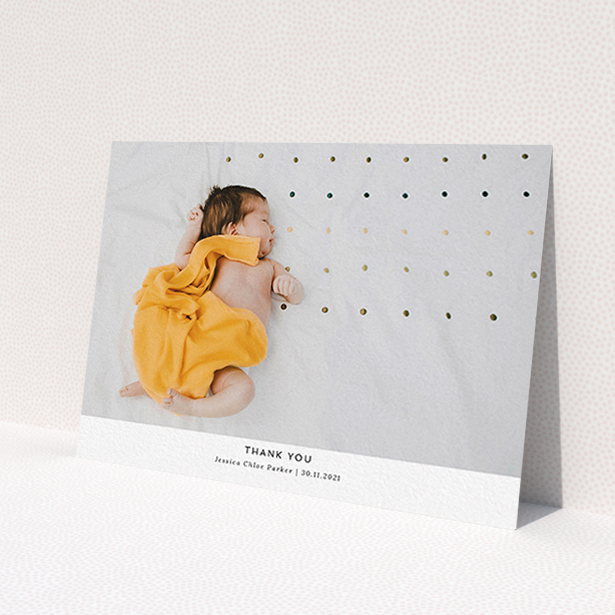 A baptism thank you card design named 'Sans Serif'. It is an A6 card in a landscape orientation. It is a photographic baptism thank you card with room for 1 photo. 'Sans Serif' is available as a flat card, with mainly white colouring.