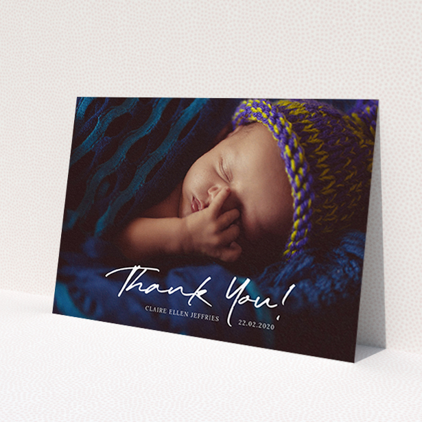 A baptism thank you card called 'Simple Appreciation'. It is an A6 card in a landscape orientation. It is a photographic baptism thank you card with room for 1 photo. 'Simple Appreciation' is available as a flat card, with mainly white colouring.
