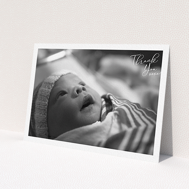 A baptism thank you card design titled 'Simple Landscape Thanks'. It is an A6 card in a landscape orientation. It is a photographic baptism thank you card with room for 1 photo. 'Simple Landscape Thanks' is available as a flat card, with mainly white colouring.