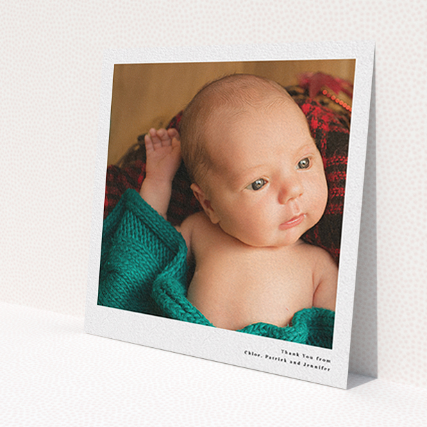 A baptism thank you card called 'Simple Portrait'. It is a square (148mm x 148mm) card in a square orientation. It is a photographic baptism thank you card with room for 1 photo. 'Simple Portrait' is available as a flat card, with mainly white colouring.