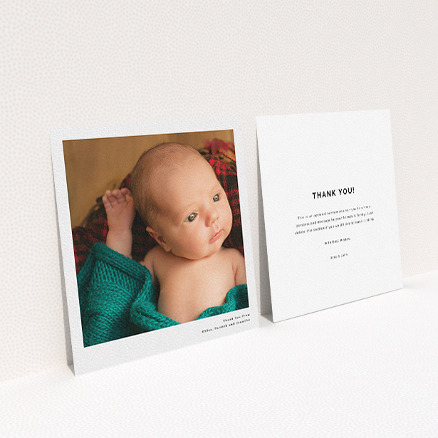 A baptism thank you card called "Simple Portrait". It is a square (148mm x 148mm) card in a square orientation. It is a photographic baptism thank you card with room for 1 photo. "Simple Portrait" is available as a flat card, with mainly white colouring.