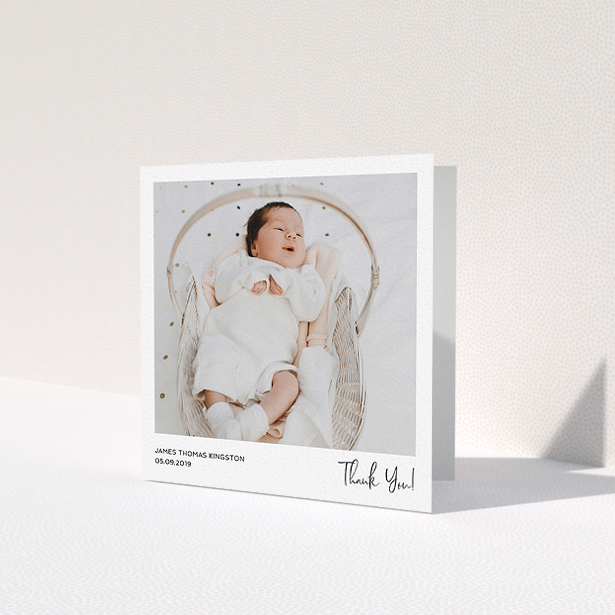 A baptism thank you card template titled 'Simple Wedding Thank You'. It is a square (148mm x 148mm) card in a square orientation. It is a photographic baptism thank you card with room for 1 photo. 'Simple Wedding Thank You' is available as a folded card, with mainly white colouring.