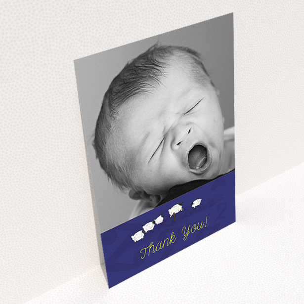 A baptism thank you card design called "Sleepy Time". It is an A5 card in a portrait orientation. It is a photographic baptism thank you card with room for 1 photo. "Sleepy Time" is available as a flat card, with tones of blue and white.