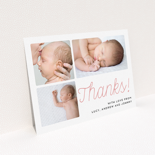 A baptism thank you card design titled "Thank You Cursive". It is an A5 card in a landscape orientation. It is a photographic baptism thank you card with room for 3 photos. "Thank You Cursive" is available as a flat card, with tones of white and pink.