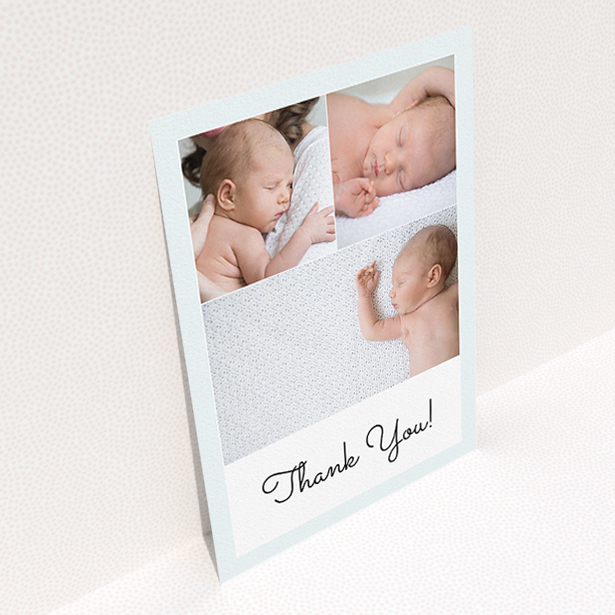 A baptism thank you card design titled "Thank You!". It is an A5 card in a portrait orientation. It is a photographic baptism thank you card with room for 3 photos. "Thank You!" is available as a flat card, with tones of blue and white.