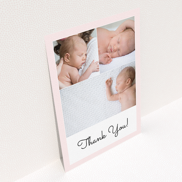 A baptism thank you card named "Thank You!". It is an A5 card in a portrait orientation. It is a photographic baptism thank you card with room for 3 photos. "Thank You!" is available as a flat card, with tones of pink and white.
