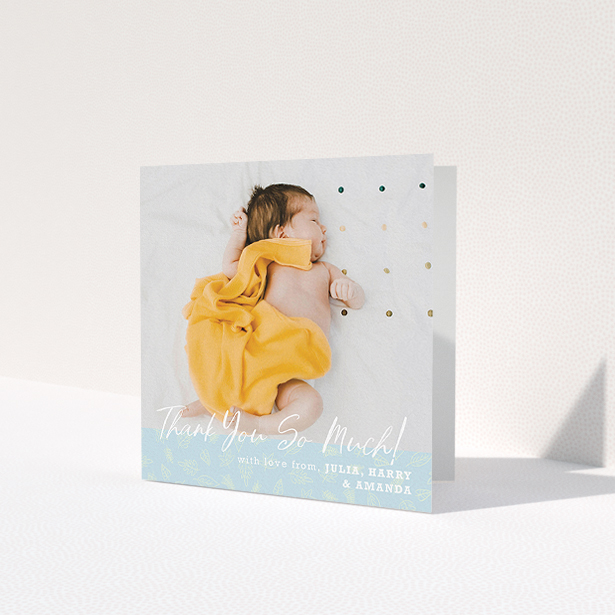 A baptism thank you card design named 'Thank You So Much'. It is a square (148mm x 148mm) card in a square orientation. It is a photographic baptism thank you card with room for 1 photo. 'Thank You So Much' is available as a folded card, with tones of blue and white.