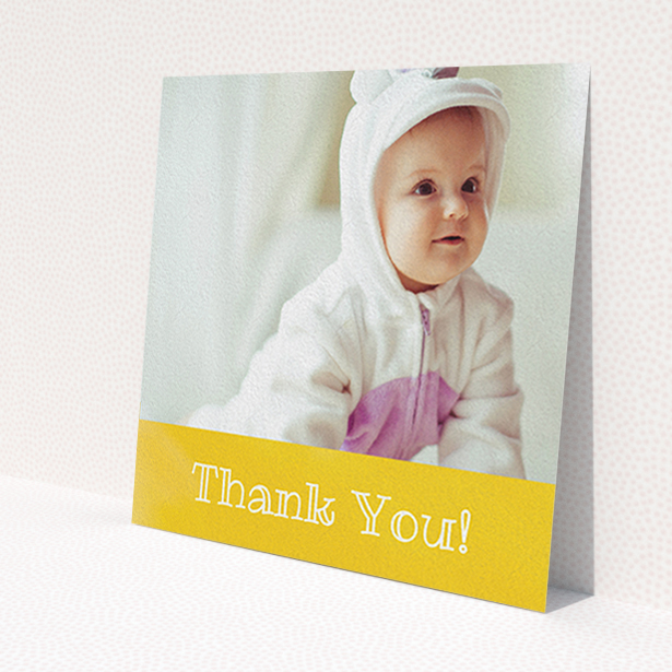 A baptism thank you card named 'Thanks In Yellow'. It is a square (148mm x 148mm) card in a square orientation. It is a photographic baptism thank you card with room for 1 photo. 'Thanks In Yellow' is available as a flat card, with tones of yellow and white.