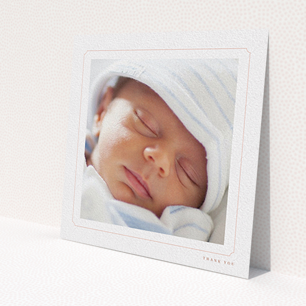 A baptism thank you card template titled 'Thin Pink'. It is a square (148mm x 148mm) card in a square orientation. It is a photographic baptism thank you card with room for 1 photo. 'Thin Pink' is available as a flat card, with tones of white and pink.