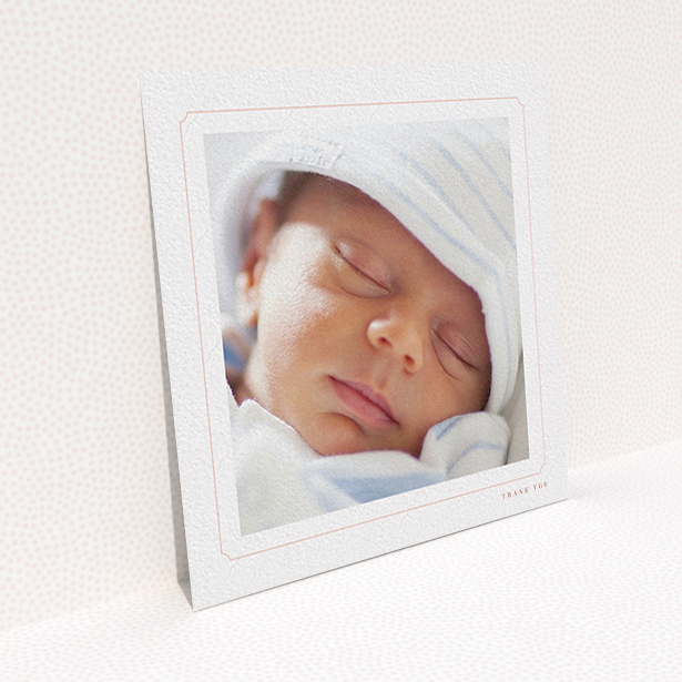 A baptism thank you card template titled "Thin Pink". It is a square (148mm x 148mm) card in a square orientation. It is a photographic baptism thank you card with room for 1 photo. "Thin Pink" is available as a flat card, with tones of white and pink.