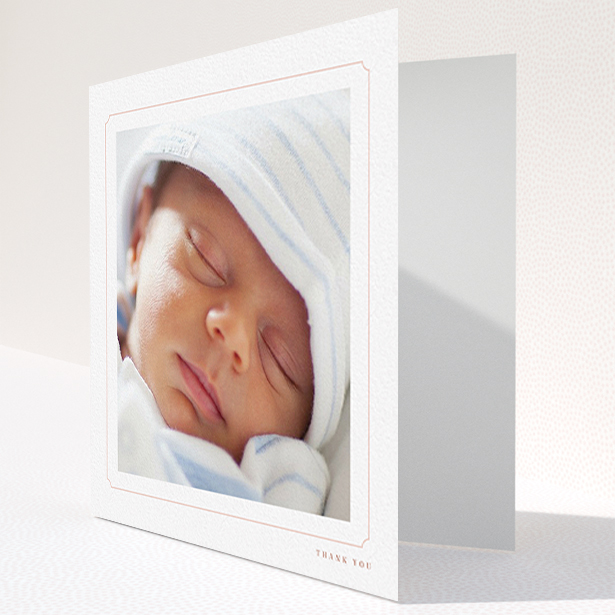 A baptism thank you card named "Thin Pink". It is a square (148mm x 148mm) card in a square orientation. It is a photographic baptism thank you card with room for 1 photo. "Thin Pink" is available as a folded card, with tones of white and pink.