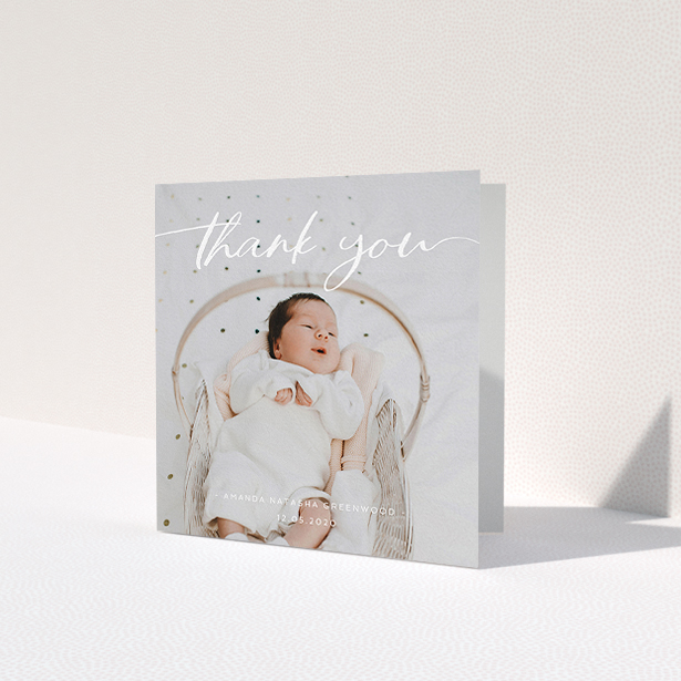 A baptism thank you card design named 'Topped and Bottomed'. It is a square (148mm x 148mm) card in a square orientation. It is a photographic baptism thank you card with room for 1 photo. 'Topped and Bottomed' is available as a folded card, with mainly white colouring.