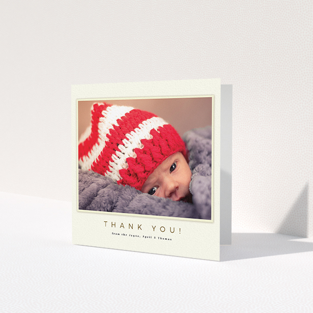 A baptism thank you card called 'Torn Cream Frame'. It is a square (148mm x 148mm) card in a square orientation. It is a photographic baptism thank you card with room for 1 photo. 'Torn Cream Frame' is available as a folded card, with mainly cream colouring.