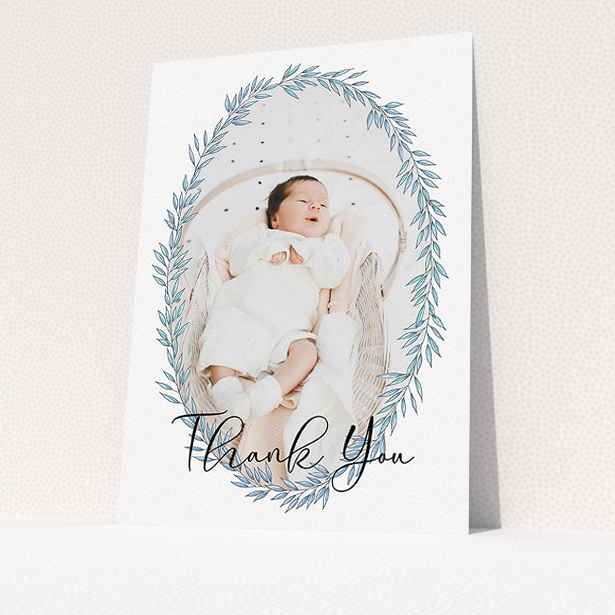 A baptism thank you card design called "Tussled Wreath". It is an A5 card in a portrait orientation. It is a photographic baptism thank you card with room for 1 photo. "Tussled Wreath" is available as a flat card, with tones of blue and white.