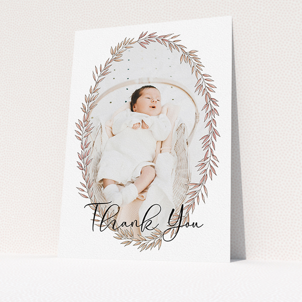A baptism thank you card design titled "Tussled Wreath". It is an A5 card in a portrait orientation. It is a photographic baptism thank you card with room for 1 photo. "Tussled Wreath" is available as a flat card, with tones of pink and white.