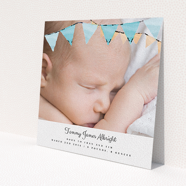A birth announcement card design named 'Blue Bunting'. It is a square (148mm x 148mm) card in a square orientation. It is a photographic birth announcement card with room for 1 photo. 'Blue Bunting' is available as a flat card, with tones of blue and white.